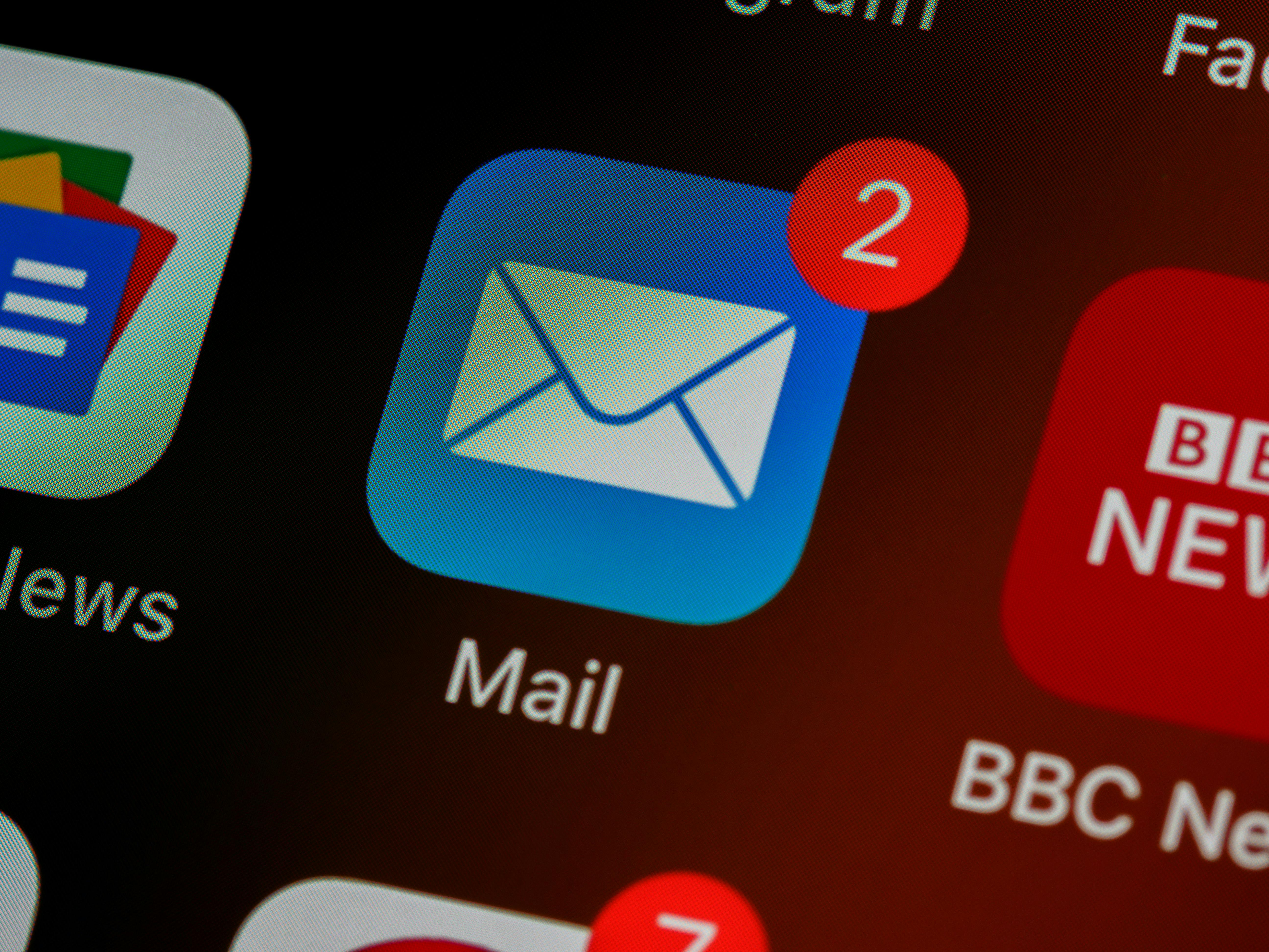 An email app on a phone shows unread messages